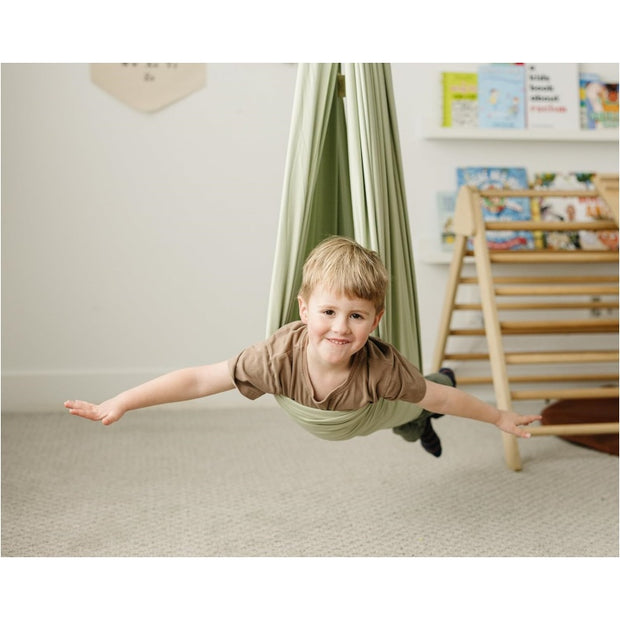 Embrace calm and development with this premium sensory compression swing